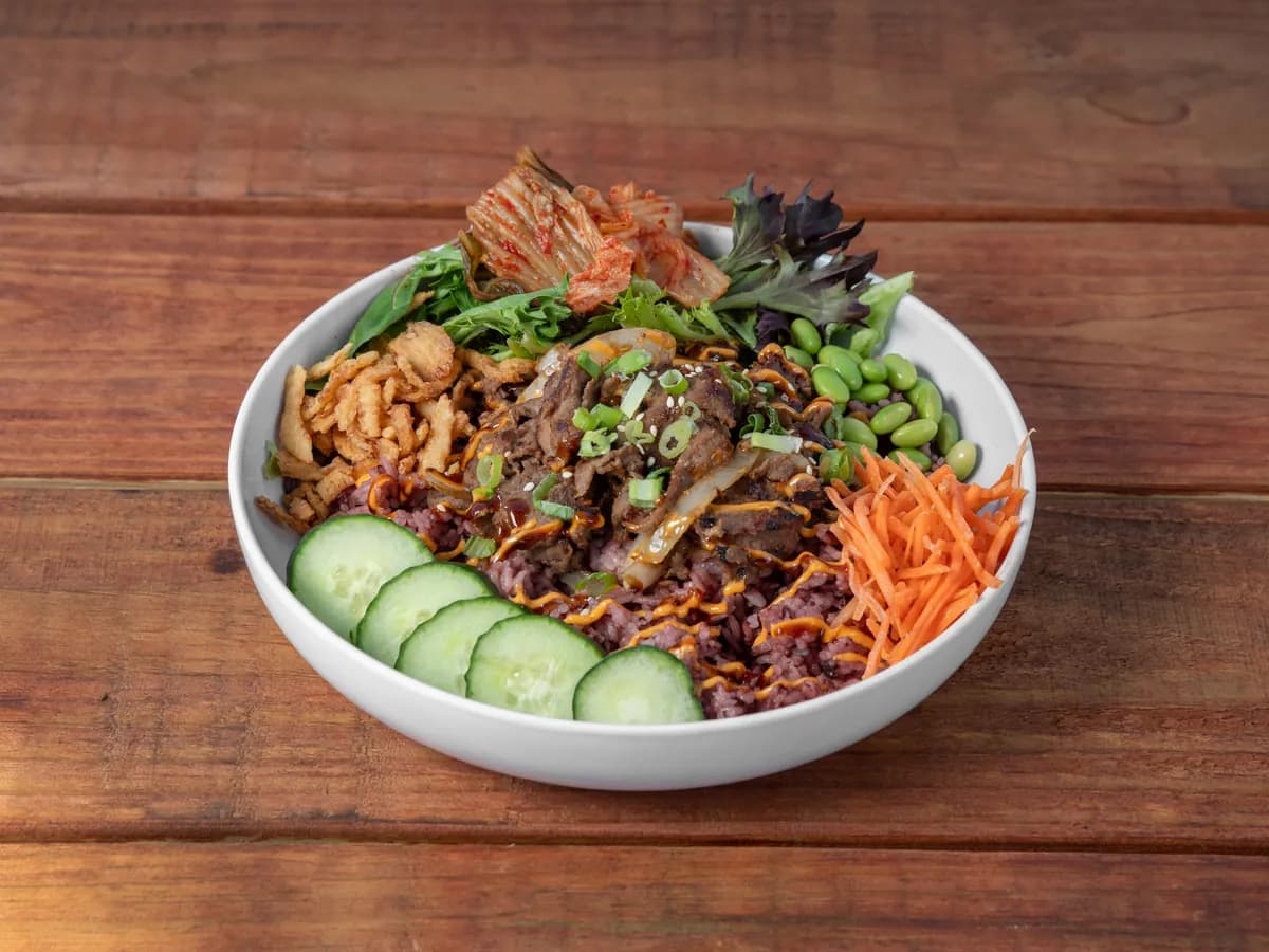 A Seoul Bowl with beef bulgogi over purple rice